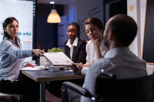Business professionals collaborating around a table